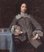 unknow artist Portrait of a gentleman,three-quarter length,standing beside a table France oil painting reproduction